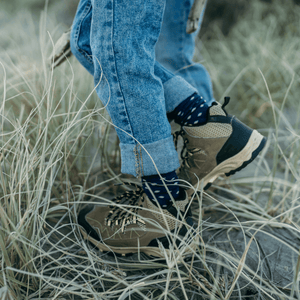 child wearing merino wool socks crew blue with oatmeal spots nz