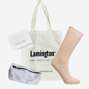 womens plush cable patterned merino lounge socks in sand colour with tote and laundry bag