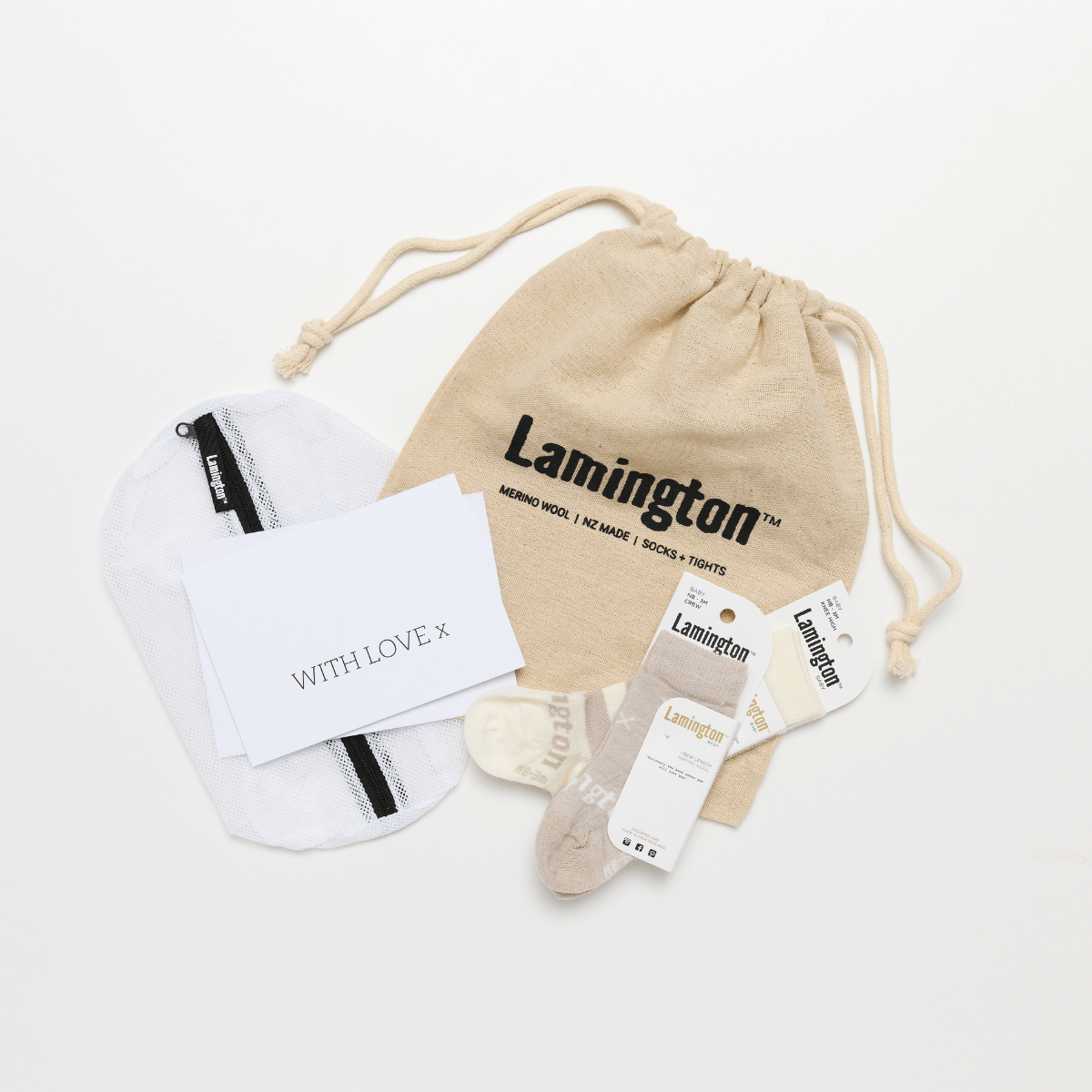packaged merino wool socks with lamington branded laundry bag, gift card and linen bag