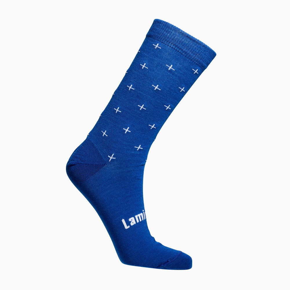 Blue sock with white cross patterns on a white background