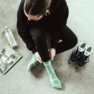 woman wearing sports socks green nz